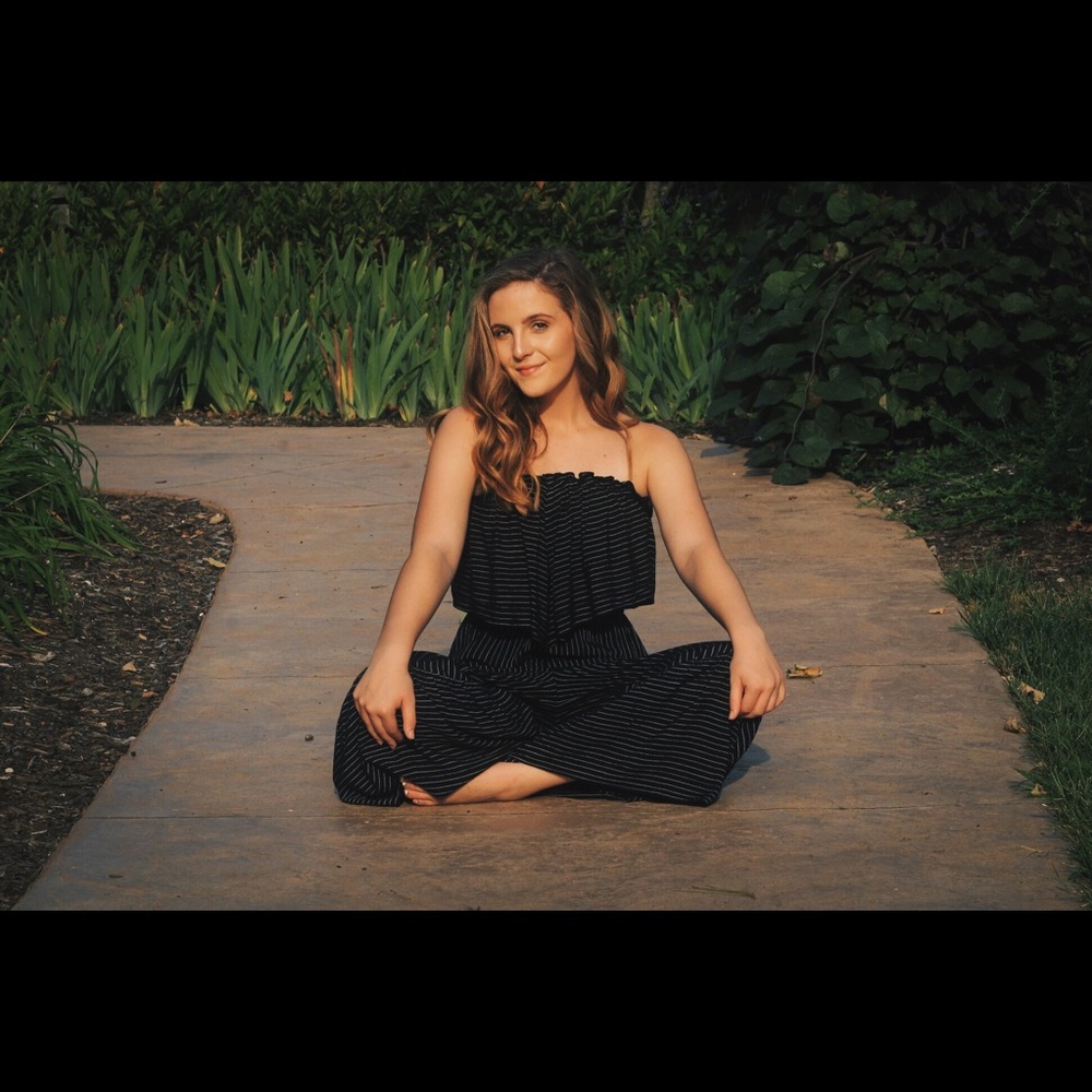 Black and white pinstripe romper flared at bottom